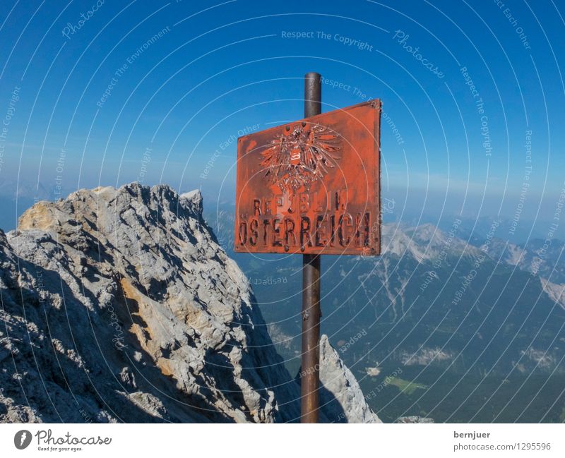 Tu felix Austria Sports Hiking Nature Sky Cloudless sky Summer Beautiful weather Alps Mountain Zugspitze Peak Stone Metal Signs and labeling Signage