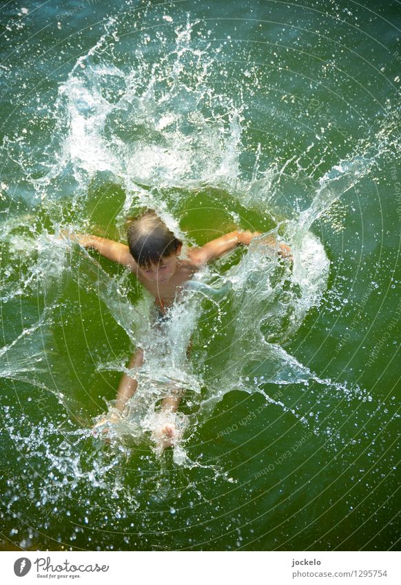 splash Masculine Child Boy (child) 1 Human being Water Beautiful weather Pond Lake Swimming & Bathing Dive Authentic Fluid Brash Happy Funny Speed Green