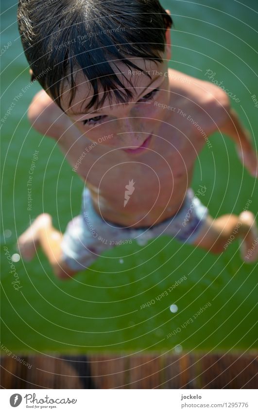 Jump and go Masculine Child Head 1 Human being 8 - 13 years Infancy Nature Water Swimming & Bathing Smart Speed Brown Green Colour photo Exterior shot Day Light