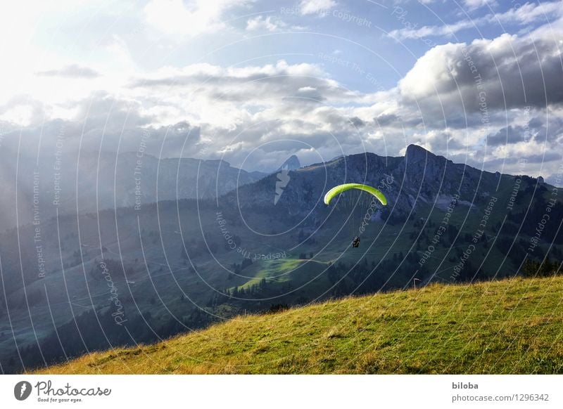 Paraglider takes off in a dreamlike evening atmosphere Paragliding Flying Gliding Hover Leisure and hobbies Vacation & Travel Freedom Mountain Hiking luck
