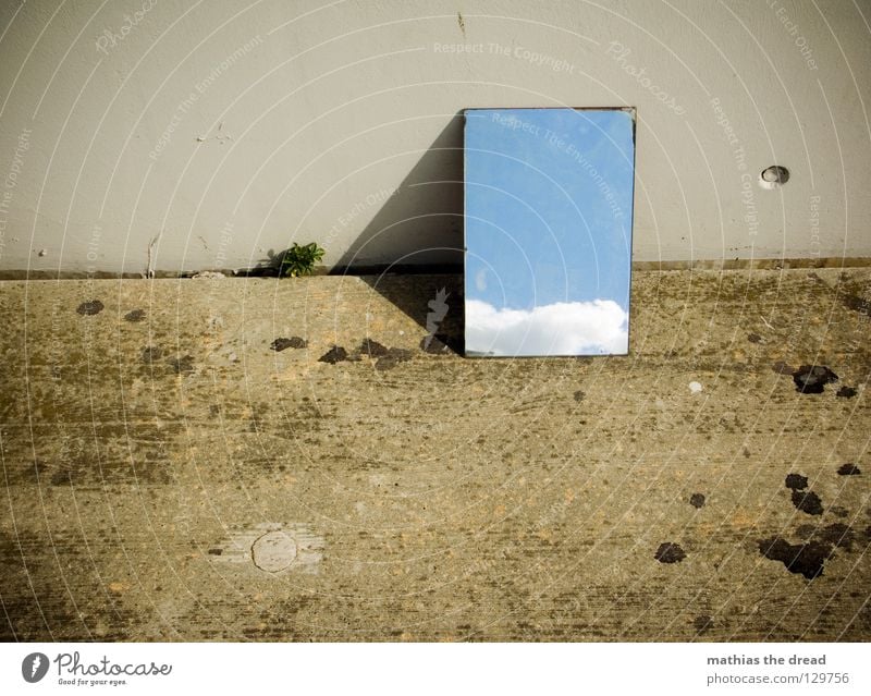 BLUE IN THE SKY Mirror Mirror image Reflection Wall (building) Facade Cold Asphalt Dark Corner Grief Loneliness Gloomy Clouds Hope Beautiful Physics Reaction