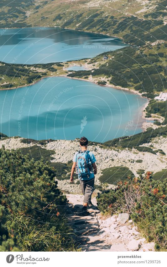 Boy walking down the mountains Trip Adventure Freedom Summer Summer vacation Mountain Hiking Boy (child) 13 - 18 years Youth (Young adults) Nature Landscape