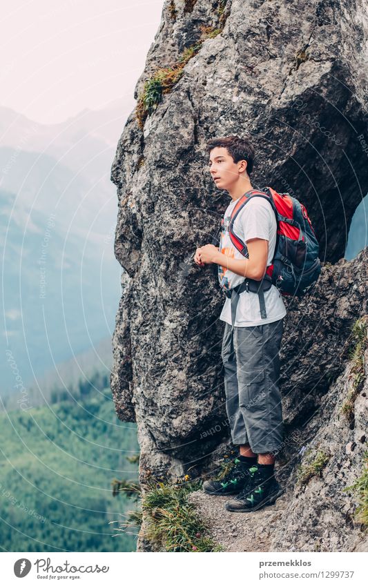 Backpacker man exploring sunset rocky mountains alone hiking adventure  journey summer vacations traveling lifestyle weekend getaway Stock Photo -  Alamy