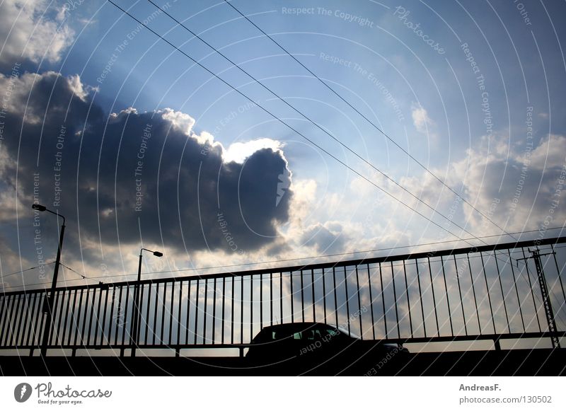 Ascension Clouds Cable Driving Lantern Transport Road traffic Bridge building Freeway Environment Environmental pollution Fine particles Road safety Safety