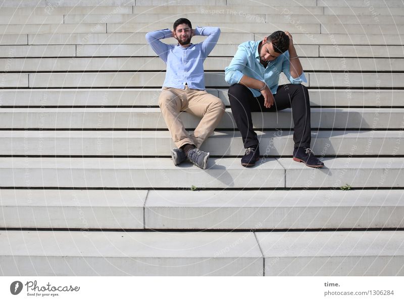 Two men sitting on a street bench looking in opposite directions - a Royalty  Free Stock Photo from Photocase