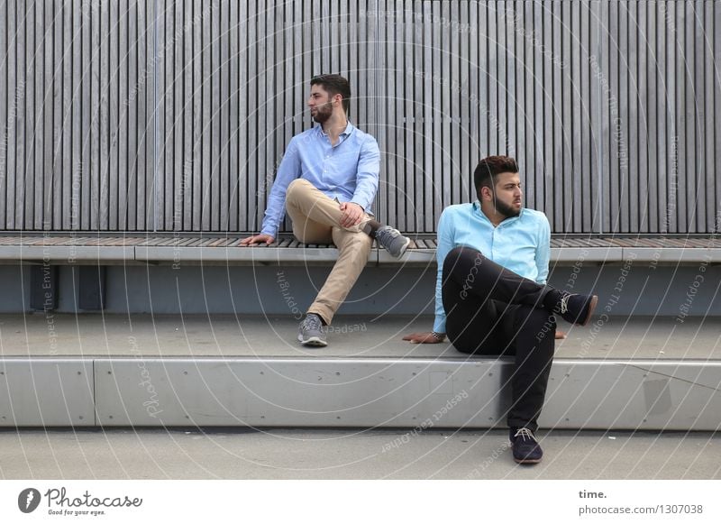 Two men sitting on a street bench looking in opposite directions Masculine 2 Human being Bridge Manmade structures Bench Shirt Pants Brunette Short-haired Beard