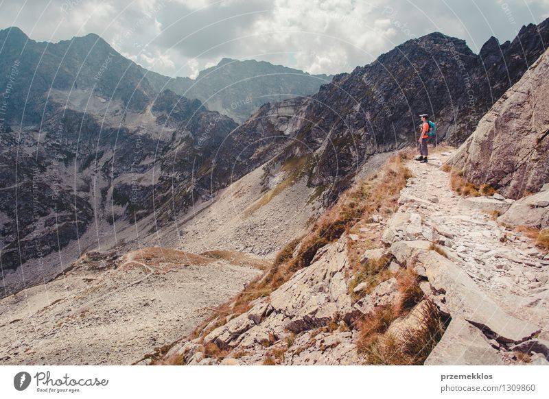 Boy hiking in the Tatra Mountains Lifestyle Vacation & Travel Trip Adventure Freedom Summer Summer vacation Hiking Young man Youth (Young adults) 1 Human being