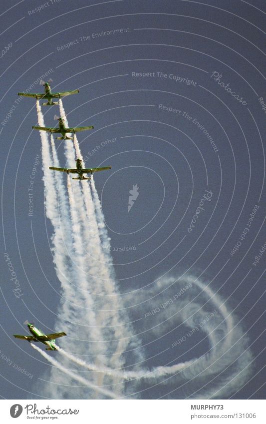 Flying acrobats in the sky Air show Airplane Two-seater Acrobat Acrobatics Smoke signal Maneuver Aerobatics Formation flying Propeller aircraft Aviation