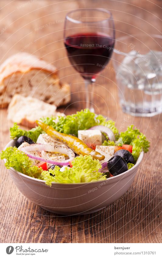 Greek salad Lettuce Salad Nutrition Dinner Organic produce Vegetarian diet Beverage Alcoholic drinks Wine Bowl Eating Cheap Good Delicious Brown Green Red