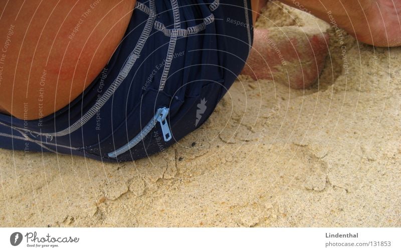 sand sitting Beach Swimming trunks Vacation & Travel Man Coast Sand Blue zipper Feet Hind quarters bobbes