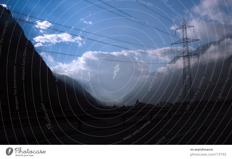 threatening valley Highway Clouds Fog Electricity Mountain Valley Sky Transmission lines Electricity pylon