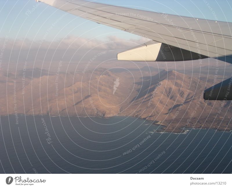 evaporated Airplane Fuerteventura Aerial photograph Ocean Wing Mountain Flying Boeing 737