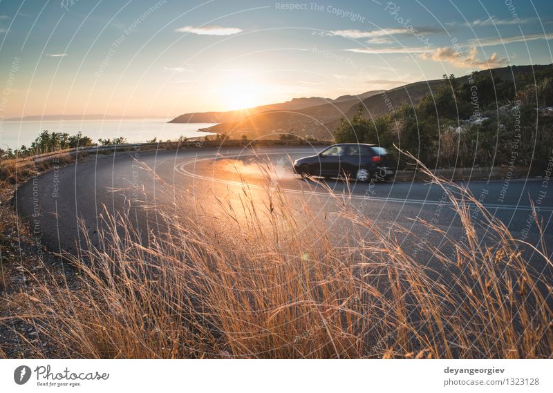 Mediterranean road on sunset Vacation & Travel Sun Mountain Environment Nature Landscape Earth Sky Autumn Tree Grass Forest Rock Canyon Village Transport Street