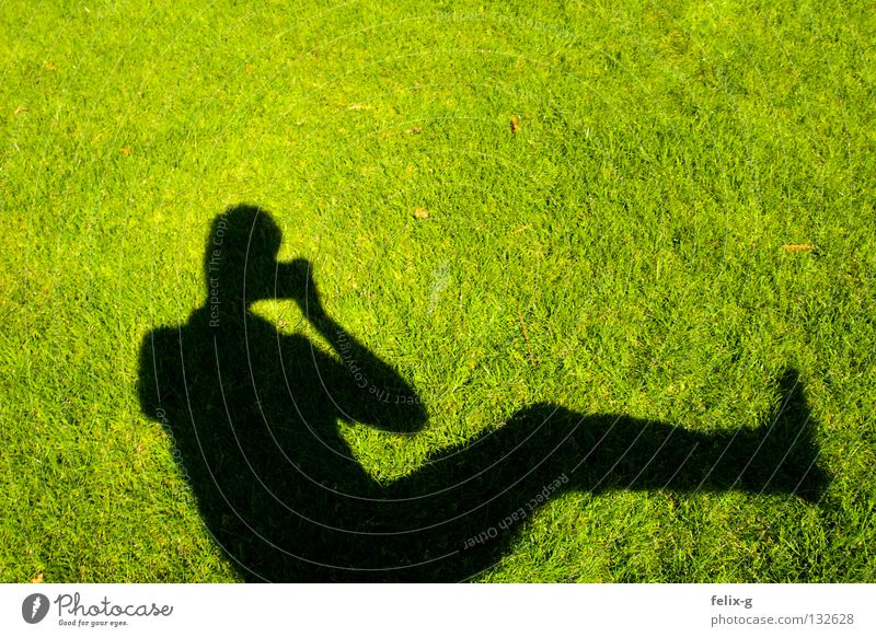 Lawn man #4 Grass Hand Drop shadow Light Green Bright green Photography Shadow Human being Legs Sun Contrast Camera