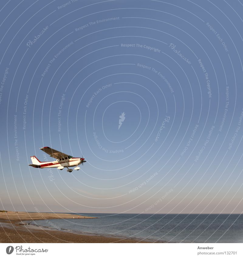 Starting plane at the beach of Helgoland Düne Colour photo Multicoloured Exterior shot Aerial photograph Day Light Sunlight Worm's-eye view Panorama (View)