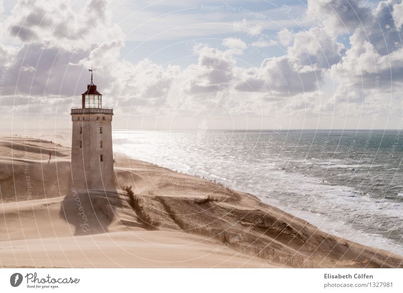Sandstorm at the lighthouse Sun Ocean Human being Nature Landscape Clouds Gale Coast North Sea Desert Lighthouse Tourist Attraction Landmark Loneliness