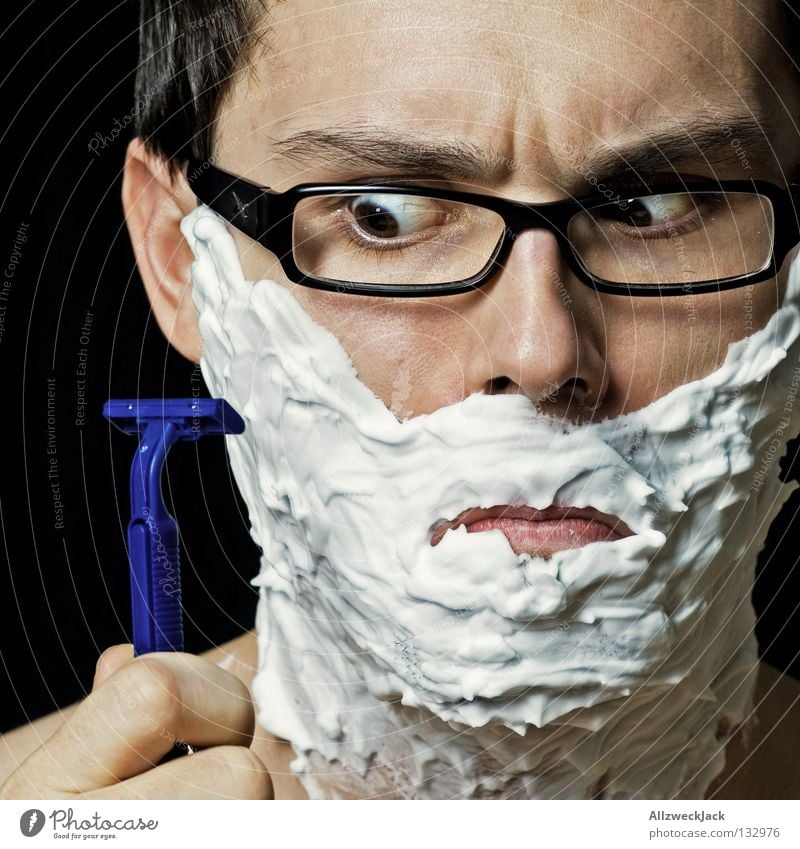 rabid Man Shave Shaving cream Eyeglasses Person wearing glasses Foam Abbreviate Unshaven Male preserve White disposable razor Cleaning Razor Skeptical