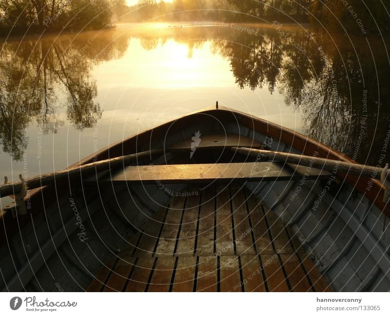 early-morning exercise Rowboat Watercraft Lake Pond Gravel pit Contentment Mirror image Morning Sunrise Romance Navigation Playing Motor barge wooden boat