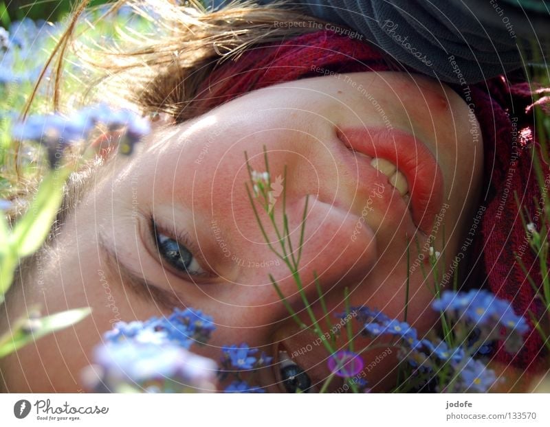 Through the flower Woman Feminine Good mood Joy Playing Childlike Spring Infatuation Calm Sunbathing To enjoy Loneliness Joie de vivre (Vitality) Flower Grass