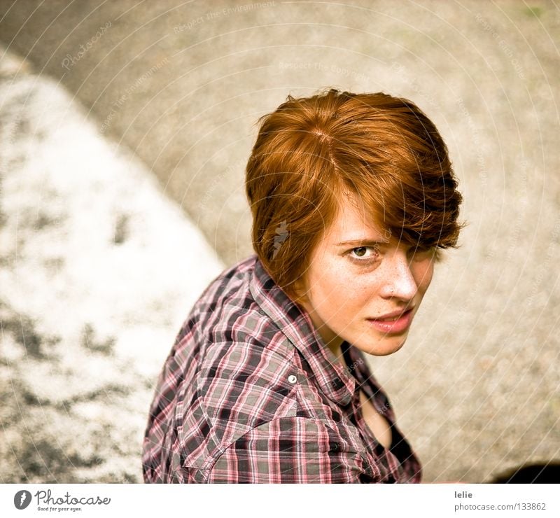 On the wall, on the lurk Shirt Woman Wall (barrier) Red Pink Freckles Red-haired Part White Gray Checkered Corner Blouse Waves Black Skeptical Challenging