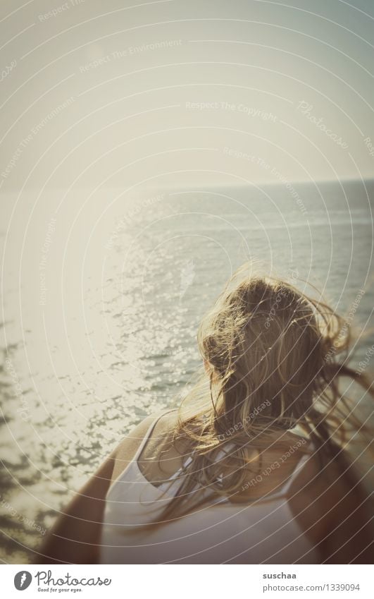 hair of a girl in the wind in front of the sea Child Girl Young woman Hair and hairstyles Disheveled Wind Ocean Water Summer Vacation & Travel Looking Sun