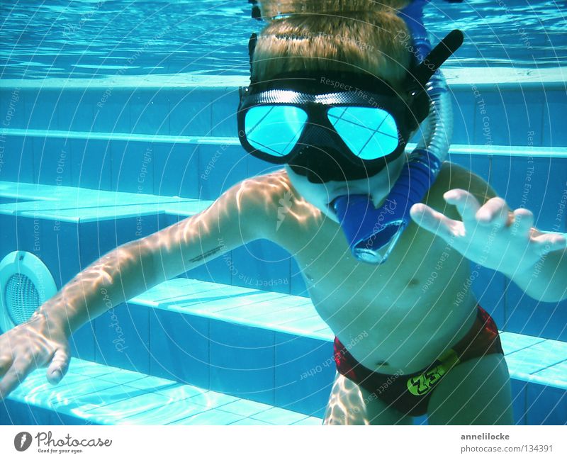 weightless in the pool Joy Playing Vacation & Travel Tourism Summer Summer vacation Waves Mirror Swimming pool Child Human being Masculine Boy (child) Infancy