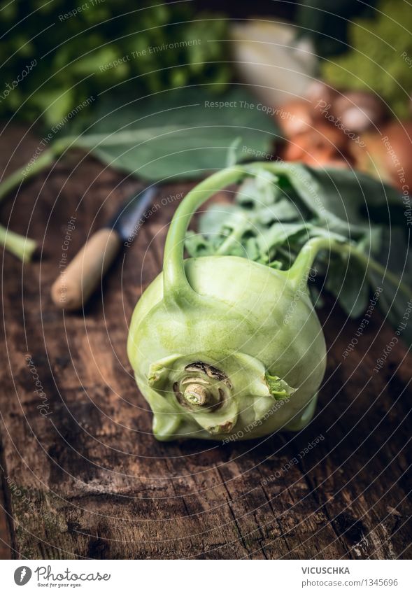 Fresh kohlrabi on a rustic kitchen table Food Vegetable Nutrition Organic produce Vegetarian diet Diet Knives Style Design Healthy Eating Life Summer Garden