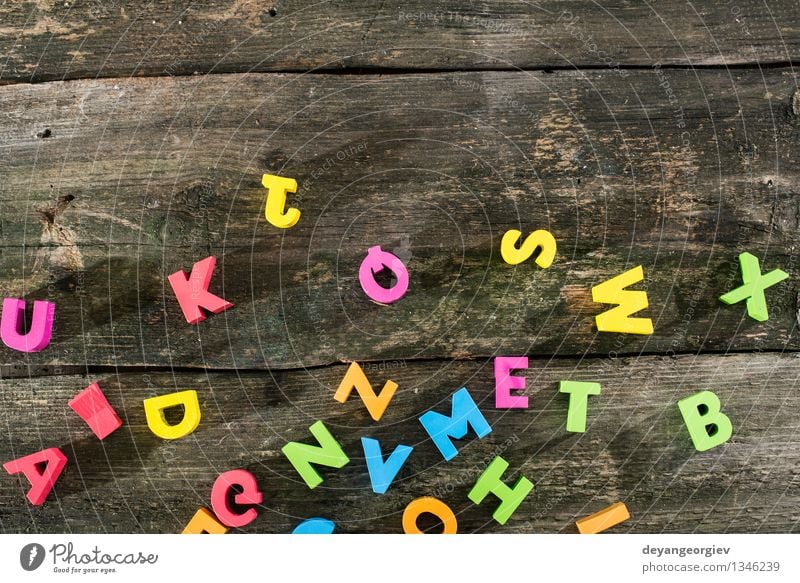 Wooden letters on wooden board Design Paper Toys Collection Old Colour alphabet colorful vintage Text background Cast iron Word abc Preschool Typography type