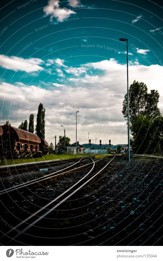 Geometry Today Clouds Green Light Tree Railroad tracks Logistics Transport HDR Afternoon Summer Horizon Industry Sky Blue wagon Switch Soft Gravel