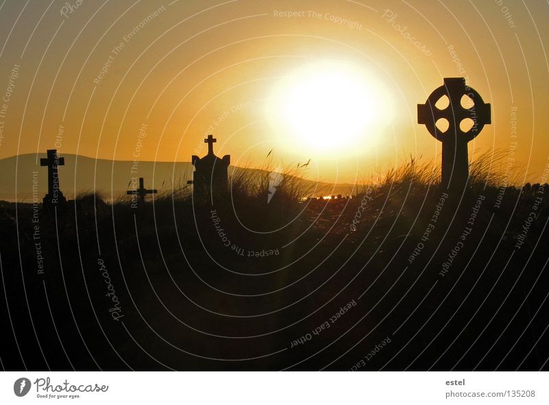 evening sensation Sunset Moody Yellow Celtic cross Archeology Past Cemetery Transience Eternity Calm Ruin Europe Ocean Hill Tombstone Memory New start Grief