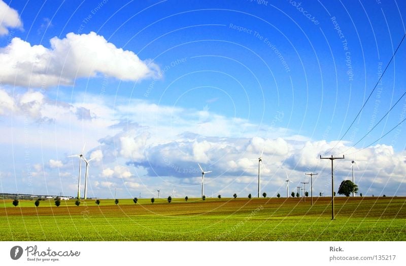 Clean Power 4. Green Wind energy plant White Technology Nature Clouds Sky Electricity Energy industry Blue Cable Electricity pylon Colour Perspective
