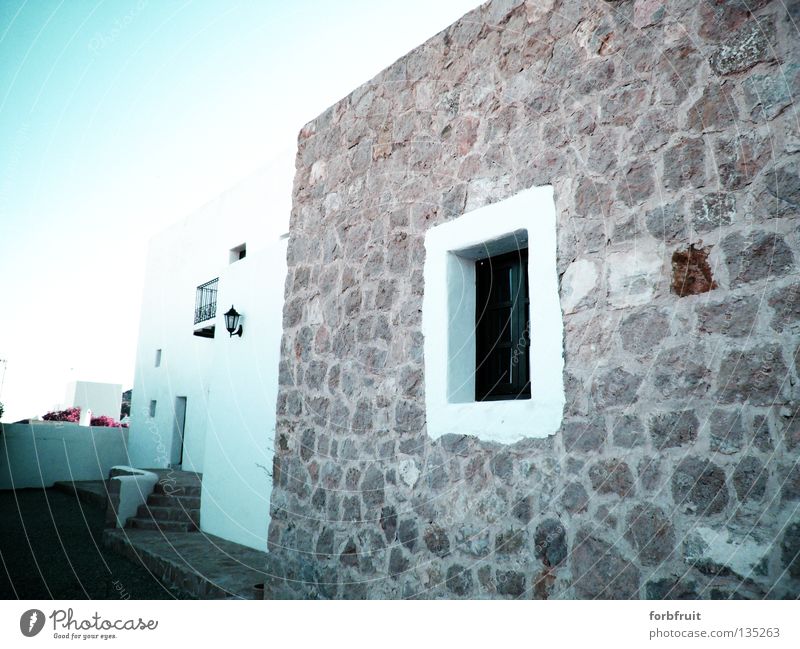 Beauty without frills Europe Spain Balearic Islands Ibiza Village Vacation home Moorish White Stone wall Window Fortress Light Historic Santa Eularia