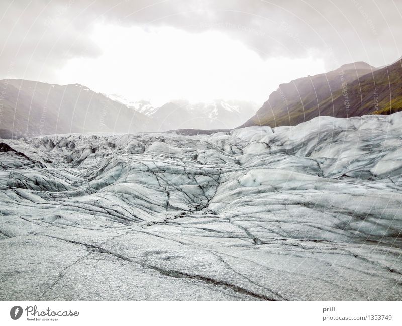 glacier in Iceland Tourism Adventure Winter Mountain Nature Landscape Clouds Hill Rock Glacier Cold Blue White Frozen Snow Peak Natural Wilderness voyage