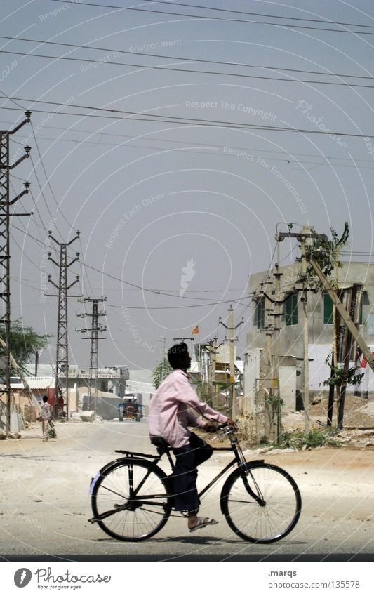 cruising Bicycle Cycling Past Vacation & Travel Tread Pedal Summer Driving Derelict Dry Electricity pylon Sand Rural Physics Hot India Transport cruise