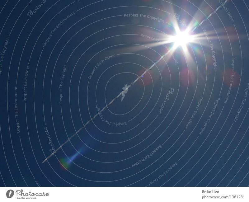 Flown out of the sun Sunbeam Light Awareness Flashy Airplane Breach Exhaust gas Vapor trail Summer Aviation Celestial bodies and the universe Lighting Sky Blue