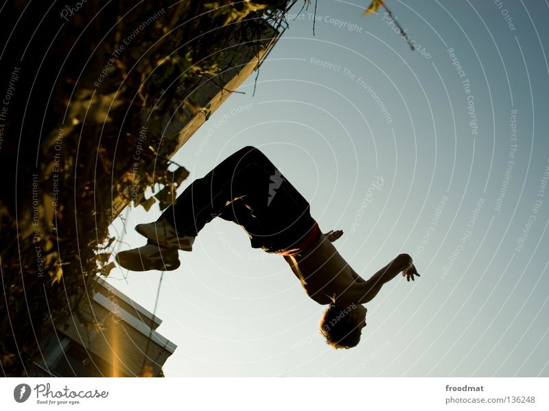 Download Parkour Man On Concrete Wall Wallpaper | Wallpapers.com