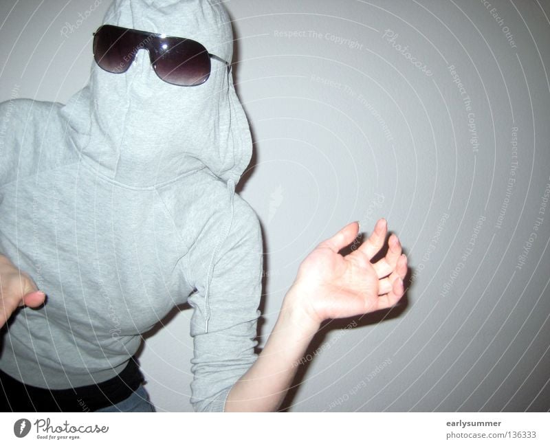Hooded person with sunglasses Dangerous Frightening Scare Shock Timidity Rotate Observe Panic Fear Hooded (clothing) Roll-necked sweater Zipper Hand Wave