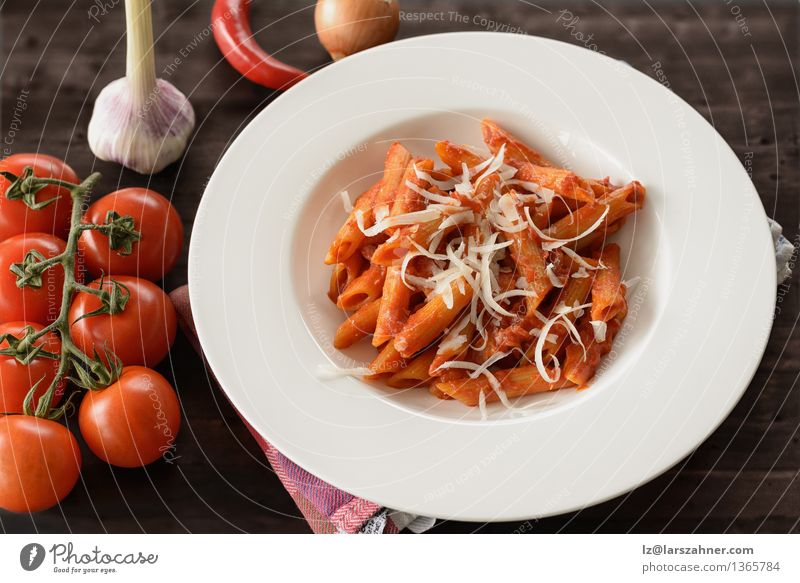 Plate of penne pasta with arrabiata sauce Cheese Herbs and spices Nutrition Lunch Fork Table Kitchen Restaurant Leaf Hot Delicious Tradition Food all'arrabiata