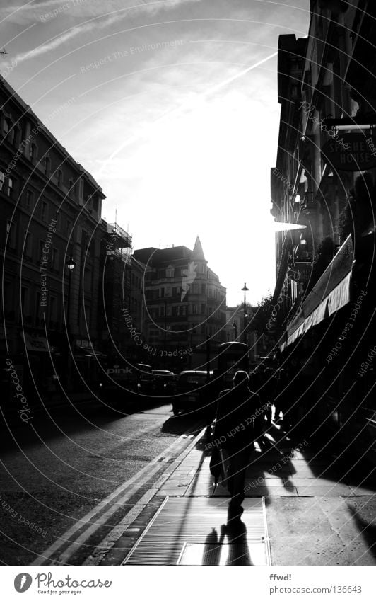 streets of soho Town City life Soho Back-light Man Human being Asphalt Sidewalk Loneliness Traffic infrastructure Black & white photo Lodon Silhouette Street