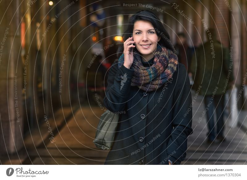 Smiling Woman in Autumn Fashion Talking on Phone Lifestyle Happy Beautiful Face Winter To talk Telephone PDA Adults 1 Human being 30 - 45 years Town Street Coat