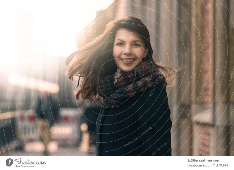 Happy woman with a lovely smile on a winter street Lifestyle Joy Face Freedom Sun Winter Woman Adults 1 Human being 30 - 45 years Nature Autumn Wind Small Town