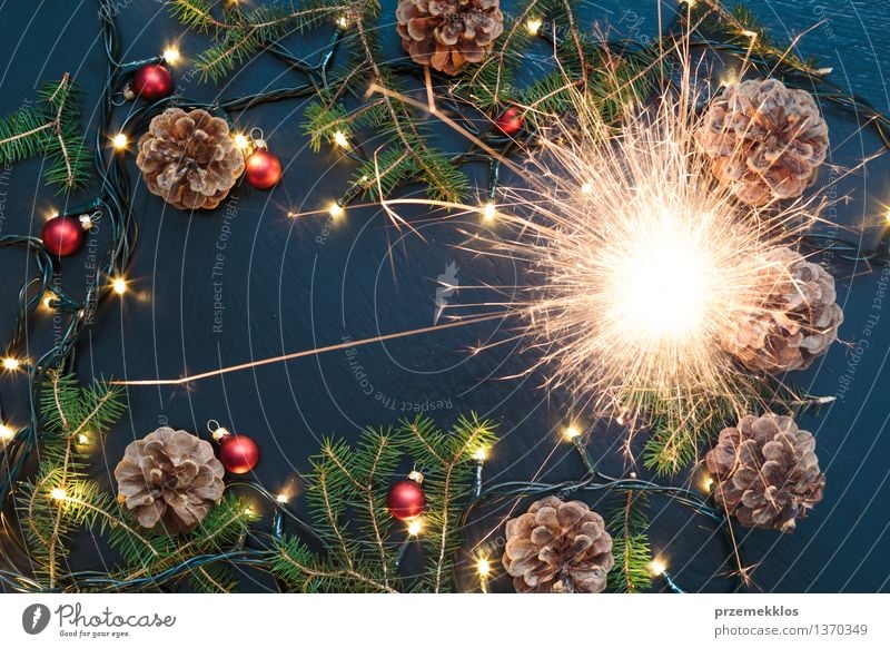 Christmas decoration with sparkler, lights and pine twigs Decoration Tradition December Story Home Horizontal Pine Spark Sparkler Colour photo Interior shot