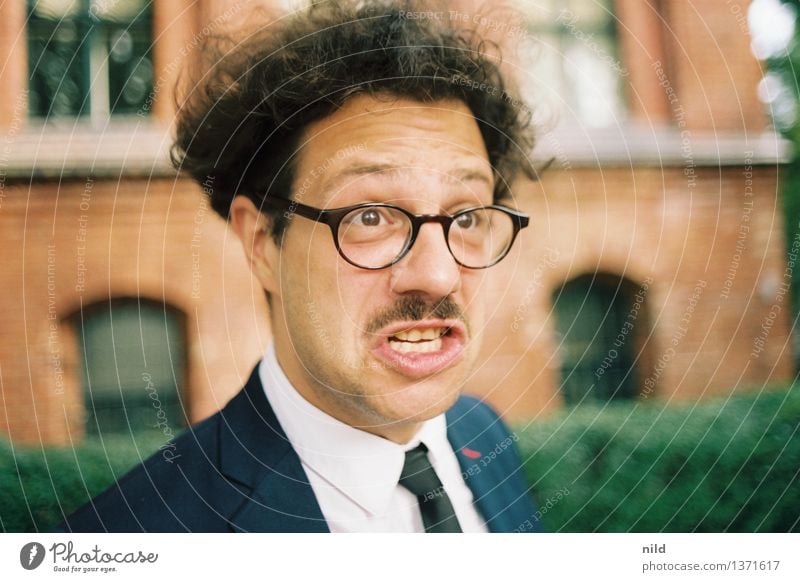 grumpy Human being Masculine Man Adults Head 1 18 - 30 years Youth (Young adults) 30 - 45 years Fashion Suit Tie Eyeglasses Black-haired Curl Moustache To talk