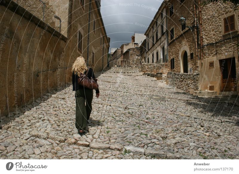 Woman on her way up - alley in Pollenca, Mallorca Alley Going Go up Majorca Effort Upward Blonde Entrance House (Residential Structure) Sweaty Sightseeing Spain