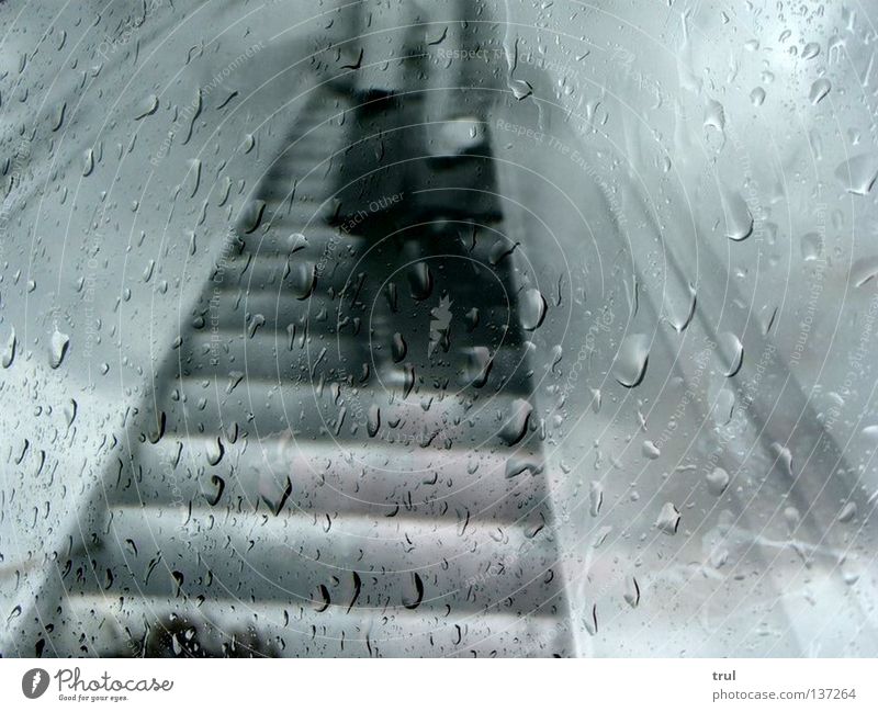 Rainy Days Collage Underground Scarf Coat Black & white photo Stairs Window pane Wait Drops of water