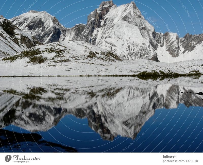 mirror image Environment Nature Landscape Water Sky Cloudless sky Summer Autumn Climate Weather Beautiful weather Ice Frost Snow Hill Rock Alps Mountain Peak