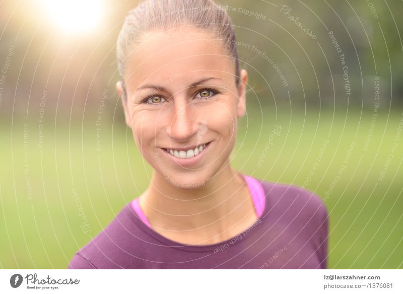 Fit Woman Smiling and Looking at the Camera Face Sports Adults Teeth Park at camera fit Flare toothy young Colour photo Exterior shot Morning Dawn Day Light