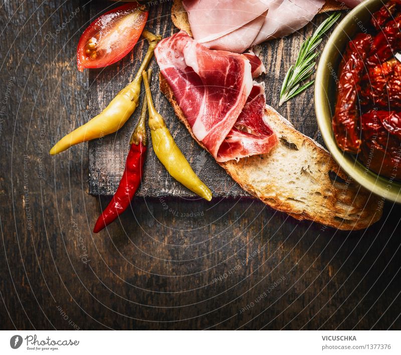 Bruschetta with Italian ham and antipasti Food Meat Sausage Vegetable Lettuce Salad Herbs and spices Breakfast Lunch Banquet Italian Food Style Design Table