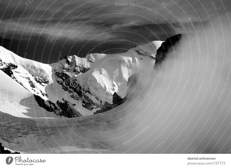 The mountain is calling!???? Clouds Peak Go up Dramatic Black White Switzerland Bernese Oberland Hiking Back-light Mountaineering Dangerous Leisure and hobbies