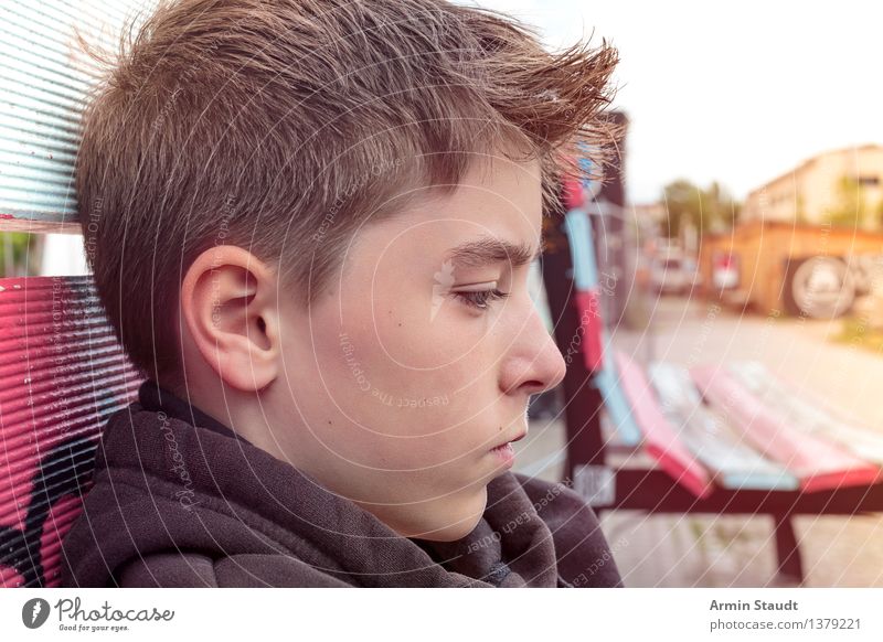 portrait of a sad teenager sitting on a bench Human being Masculine Young man Youth (Young adults) Head 1 13 - 18 years Summer Town Hair and hairstyles Brunette